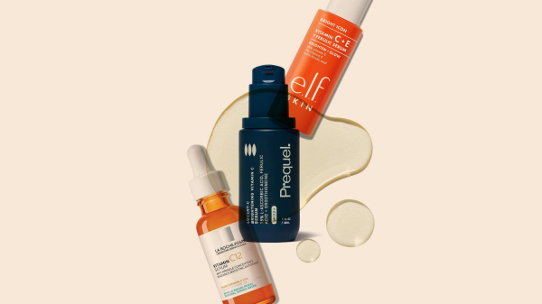 vitamin c serums on a peachy background