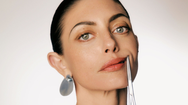 Image may contain Body Part Face Head Neck Person Adult Photography Portrait Accessories Earring and Jewelry